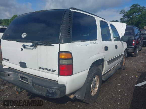 2005 Chevrolet Tahoe LT with VIN 1GNEC13T35J207547, listed as a IAAI auction lot 42185904 with 327,200 mi miles and . Bid and sale history available at DreamBid. Image 4.
