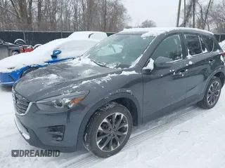 2016 Mazda CX-5 Grand Touring with VIN JM3KE4DY2G0913412, listed as a IAAI auction lot 41616132 with 85,166 mi miles. Bid and sale history available at carsss.com. Image 17.