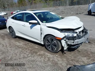 2017 Honda Civic Sedan EX-T with VIN 2HGFC1E39HH644602, listed as a IAAI auction lot 41920127 with 102,360 mi miles. Bid and sale history available at carsss.com. Image 1.