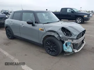 2015 MINI Hardtop 4 Door with VIN WMWXS5C52FT829699, listed as a IAAI auction lot 42078187 with 59,641 mi miles and . Bid and sale history available at DreamBid. Image 1.