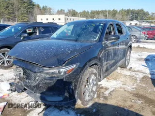 2020 Mazda CX-5 Grand Touring with VIN JM3KFBDM7L1807685, listed as a IAAI auction lot 41392313 with 91,729 mi miles and . Bid and sale history available at carsss.com. Image 2.