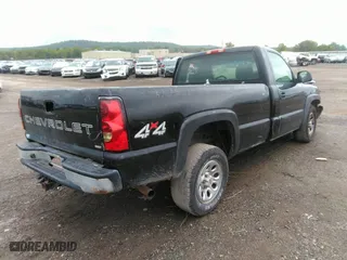 2005 Chevrolet Silverado 1500 LS with VIN 1GCEK14V55Z343823, listed as a IAAI auction lot 37501934 with 214,767 mi miles. Bid and sale history available at carsss.com. Image 4.