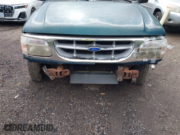 1996 Ford Explorer XL with VIN 1FMDU34XXTZA72897, listed as a IAAI auction lot 42189017 with 169,520 mi miles and . Bid and sale history available at DreamBid. Image 6.