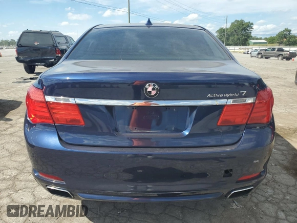 2012 BMW 7 Series with VIN WBAKX6C58CC197207, listed as a Copart auction lot 84153784 with 130,049 mi miles and Salvage title. Bid and sale history available at DreamBid. Image 6.