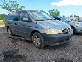 2000 Honda Odyssey EX z VIN 2HKRL1870YH623901, wystawiony jako IAAI lot #42188870 z przebiegiem 151 254 mil mil oraz . Historia ofert i sprzedaży dostępna na DreamBid. Obrazek 1.