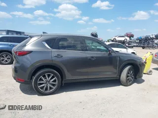2017 Mazda CX-5 Grand Touring with VIN JM3KFADL3H0227655, listed as a IAAI auction lot 41897981 with 103,545 mi miles. Bid and sale history available at carsss.com. Image 13.