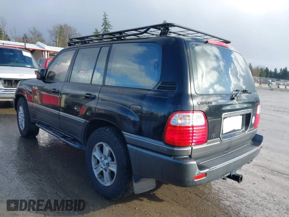 2001 Lexus LX 470 with VIN JTJHT00W613500563, listed as a IAAI auction lot 41730804 with 232,647 mi miles and . Bid and sale history available at carsss.com. Image 3.