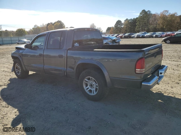 2004 Dodge Dakota SLT with VIN 1D7HL48NX4S579127, listed as a Copart auction lot 83688784 with 261,990 mi miles and Salvage Title. Bid and sale history available at carsss.com. Image 2.