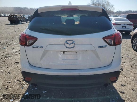 2015 Mazda CX-5 Touring with VIN JM3KE2CY4F0436082, listed as a Copart auction lot 50505365 with 140,835 mi miles and Clean Title. Bid and sale history available at DreamBid. Image 7.