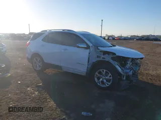 2021 Chevrolet Equinox Premier z VIN 3GNAXNEV0MS154053, wystawiony jako IAAI lot #41311479 z przebiegiem 63 966 mil mil oraz . Historia ofert i sprzedaży dostępna na DreamBid. Obrazek 1.
