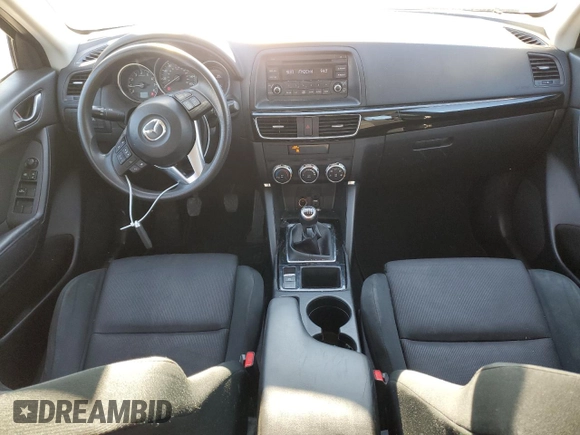 2016 Mazda CX-5 Sport with VIN JM3KE2BE1G0629430, listed as a Copart auction lot 82442654 with 130,289 mi miles and Salvage Title. Bid and sale history available at DreamBid. Image 8.