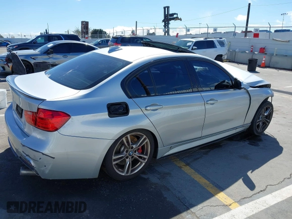 2014 BMW 3 Series 335i with VIN WBA3A9G59ENS64793, listed as a IAAI auction lot 41746865 with 93,899 mi miles. Bid and sale history available at carsss.com. Image 4.