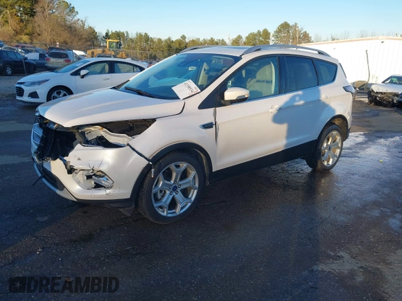 2017 Ford Escape Titanium with VIN 1FMCU0J98HUA75690, listed as a IAAI auction lot 41358534 with 90,376 mi miles. Bid and sale history available at carsss.com. Image 19.