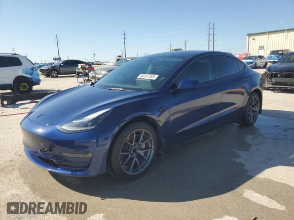 2022 Tesla Model 3 with VIN 5YJ3E1EA8NF322335, listed as a Copart auction lot 48187265 with 22,265 mi miles and Clean Title. Bid and sale history available at DreamBid. Image 1.