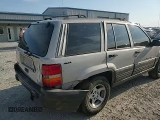 1998 Jeep Grand Cherokee Laredo with VIN 1J4GZ58S8WC301754, listed as a Copart auction lot 69698144 with 205,739 mi miles and Non Repairable. Bid and sale history available at carsss.com. Image 11.