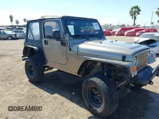2005 Jeep Wrangler Sport with VIN 1J4FA49S65P342497, listed as a IAAI auction lot 41674606 with 123,457 mi miles. Bid and sale history available at carsss.com. Image 6.