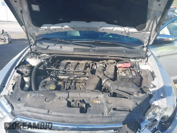2014 Ford Taurus Limited with VIN 1FAHP2F8XEG133523, listed as a IAAI auction lot 40285220 with 134,939 mi miles. Bid and sale history available at carsss.com. Image 10.