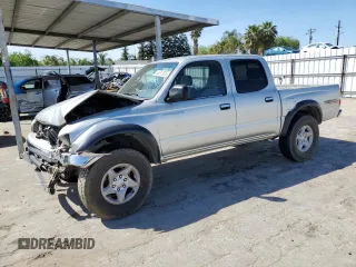 2002 Toyota Tacoma PreRunner with VIN 5TEGN92N12Z022296, listed as a Copart auction lot 49517835 with 188,590 mi miles and Salvage title. Bid and sale history available at DreamBid. Image 1.