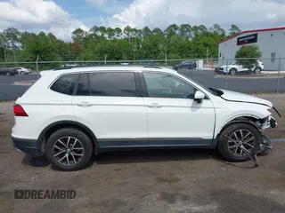 2021 Volkswagen Tiguan SE z VIN 3VV2B7AX5MM057743, wystawiony jako IAAI lot #42471192 z przebiegiem 80 133 mil mil oraz . Historia ofert i sprzedaży dostępna na DreamBid. Obrazek 13.