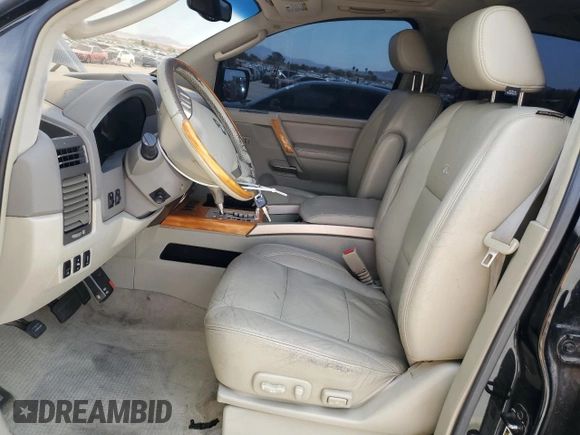 2005 Infiniti QX56 z VIN 5N3AA08C65N800718, wystawiony jako Copart lot #54229265 z przebiegiem 222 803 mil mil oraz Szkoda całkowita • Salvage title. Historia ofert i sprzedaży dostępna na DreamBid. Obrazek 7.