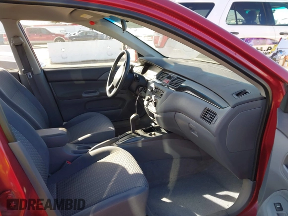 2002 Mitsubishi Lancer LS with VIN JA3AJ36E82U063279, listed as a IAAI auction lot 41711543 with 39,127 mi miles. Bid and sale history available at carsss.com. Image 5.