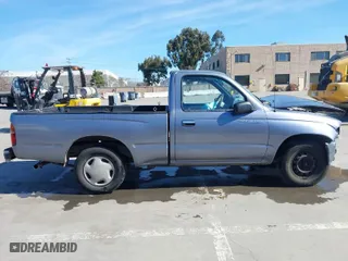 1998 Toyota Tacoma with VIN 4TANL42N8WZ136647, listed as a IAAI auction lot 41635748 with 218,836 mi miles. Bid and sale history available at carsss.com. Image 14.