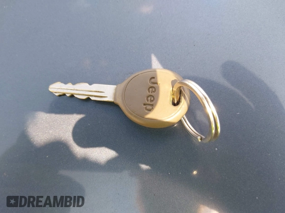 2002 Jeep Grand Cherokee Laredo with VIN 1J4GW48SX2C206755, listed as a IAAI auction lot 42631502 with 155,752 mi miles and . Bid and sale history available at DreamBid. Image 11.