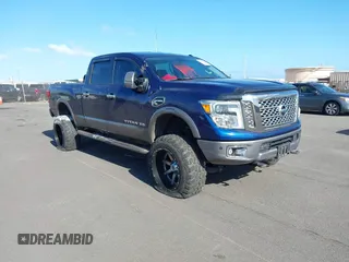 2016 Nissan Titan Platinum Reserve with VIN 1N6BA1F49GN500304, listed as a IAAI auction lot 42182827 with 146,249 mi miles and . Bid and sale history available at DreamBid. Image 1.