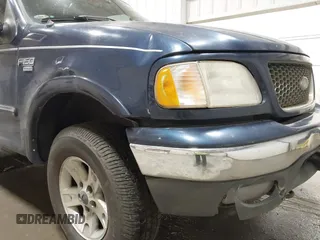 2003 Ford F-150 XLT z VIN 1FTRW08L73KC11631, wystawiony jako IAAI lot #42673130 z przebiegiem 188 945 mil mil oraz . Historia ofert i sprzedaży dostępna na DreamBid. Obrazek 6.