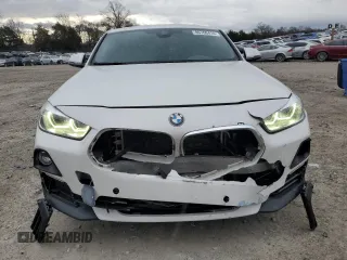 2019 BMW X2 sDrive28i with VIN WBXYJ3C58K5N39693, listed as a Copart auction lot 86760414 with 77,668 mi miles and Salvage Title. Bid and sale history available at carsss.com. Image 5.