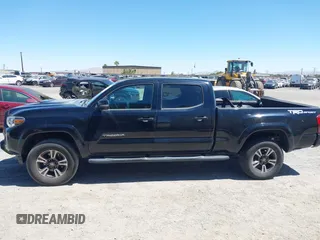 2018 Toyota Tacoma SR5 with VIN 3TMBZ5DN1JM014540, listed as a IAAI auction lot 42505324 with 112,990 mi miles and . Bid and sale history available at DreamBid. Image 14.