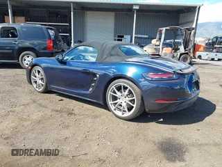 2018 Porsche 718 Boxster z VIN WP0CA2A8XJS210766, wystawiony jako IAAI lot #41617239 z przebiegiem 55 336 mil mil oraz . Historia ofert i sprzedaży dostępna na DreamBid. Obrazek 3.
