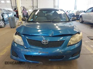 2009 Toyota Corolla with VIN 1NXBU40E19Z027256, listed as a IAAI auction lot 41383298 with 221,545 mi miles. Bid and sale history available at carsss.com. Image 12.