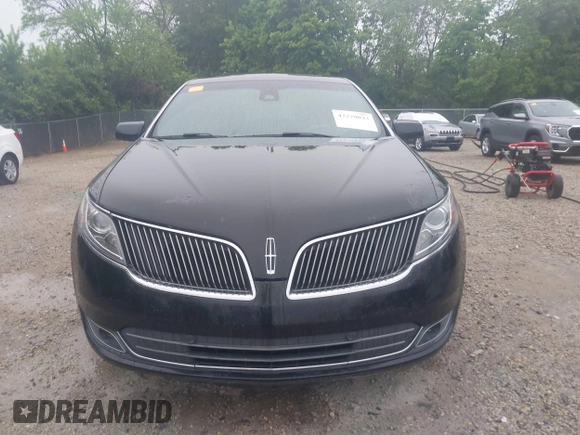 2013 Lincoln MKS EcoBoost with VIN 1LNHL9FT4DG607785, listed as a IAAI auction lot 42279833 with 126,548 mi miles and . Bid and sale history available at DreamBid. Image 12.