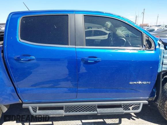 2019 GMC Canyon 4WD SLE z VIN 1GTG6CENXK1222416, wystawiony jako IAAI lot #41878077 z przebiegiem 85 415 mil mil oraz . Historia ofert i sprzedaży dostępna na DreamBid. Obrazek 14.