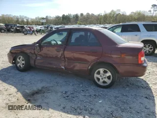 2003 Mazda Protege DX with VIN JM1BJ225030144551, listed as a Copart auction lot 50769905 with 179,876 mi miles and Salvage Title. Bid and sale history available at DreamBid. Image 2.
