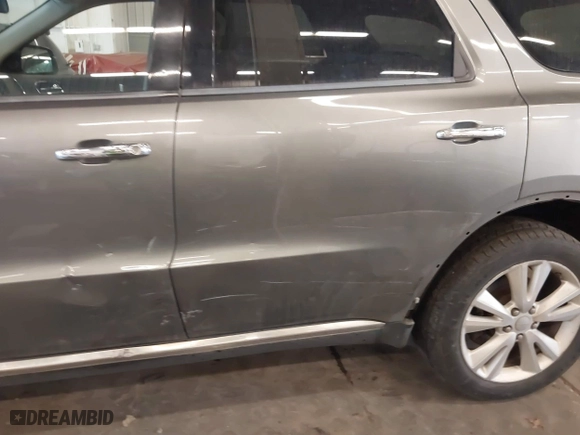 2013 Dodge Durango Crew with VIN 1C4RDJDG1DC601432, listed as a IAAI auction lot 41600743 with 133,275 mi miles. Bid and sale history available at carsss.com. Image 20.