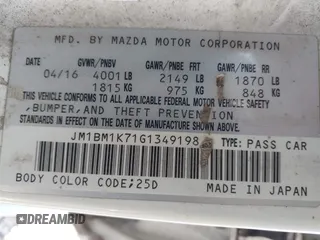 2016 Mazda 3 i Sport with VIN JM1BM1K71G1349198, listed as a IAAI auction lot 41084727 with 205,624 mi miles and . Bid and sale history available at DreamBid. Image 9.