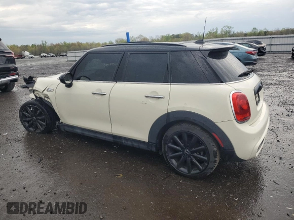 2018 MINI Hardtop 4 Door Cooper S with VIN WMWXU3C51J2F50454, listed as a Copart auction lot 53236535 with 65,151 mi miles and Salvage title. Bid and sale history available at DreamBid. Image 2.