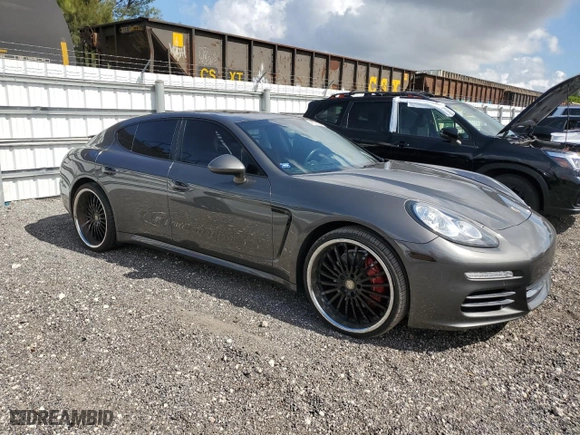 2016 Porsche Panamera 4 with VIN WP0AA2A74GL006367, listed as a Copart auction lot 49026323 with 57,384 mi miles. Bid and sale history available at carsss.com. Image 4.