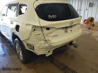 2019 Hyundai Santa Fe SE with VIN 5NMS2CAD4KH120957, listed as a IAAI auction lot 41937085 with 101,584 mi miles. Bid and sale history available at carsss.com. Image 6.