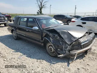 1992 Chrysler New Yorker z VIN 1C3XV66R2ND759195, wystawiony jako Copart lot #69650044 z przebiegiem 70 387 mil mil oraz Szkody całkowita. Historia ofert i sprzedaży dostępna na DreamBid. Obrazek 4.