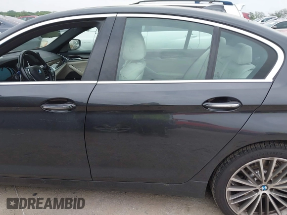 2018 BMW 5 Series 530e with VIN WBAJA9C55JB033575, listed as a IAAI auction lot 42067380 with 111,902 mi miles and . Bid and sale history available at DreamBid. Image 14.