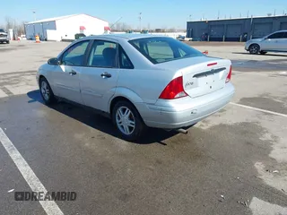 2004 Ford Focus SE with VIN 1FAFP34394W120884, listed as a IAAI auction lot 41663180 with 213,972 mi miles and . Bid and sale history available at DreamBid. Image 3.