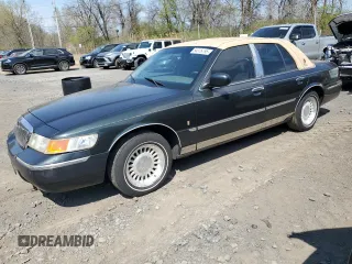 1999 Mercury Grand Marquis LS with VIN 2MEFM75W0XX731008, listed as a Copart auction lot 54375795 with 88,080 mi miles and Salvage Title. Bid and sale history available at DreamBid. Image 1.