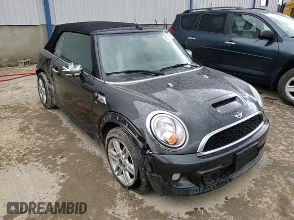 2014 MINI Convertible S with VIN WMWZP3C53ET298154, listed as a Copart auction lot 53971615 with 85,499 mi miles and Salvage title. Bid and sale history available at DreamBid. Image 14.