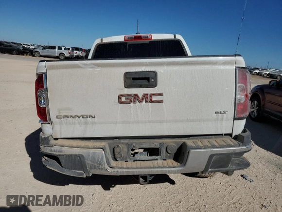 2017 GMC Canyon 4WD SLT with VIN 1GTP6DE18H1301885, listed as a Copart auction lot 77217864 with 119,413 mi miles and Salvage Title. Bid and sale history available at carsss.com. Image 6.