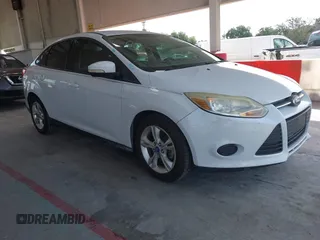 2013 Ford Focus SE z VIN 1FADP3F25DL220283, wystawiony jako IAAI lot #42707111 z przebiegiem 149 646 mil mil oraz . Historia ofert i sprzedaży dostępna na DreamBid. Obrazek 1.