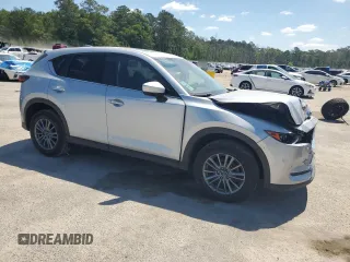 2020 Mazda CX-5 Touring z VIN JM3KFBCM2L1824072, wystawiony jako Copart lot #54825295 z przebiegiem 99 420 mil mil oraz Szkoda całkowita • Salvage title. Historia ofert i sprzedaży dostępna na DreamBid. Obrazek 4.