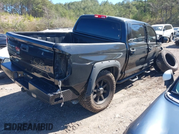 2014 Toyota Tundra 4WD Truck SR5 with VIN 5TFDW5F15EX337114, listed as a IAAI auction lot 41734727 with 209,163 mi miles. Bid and sale history available at carsss.com. Image 4.